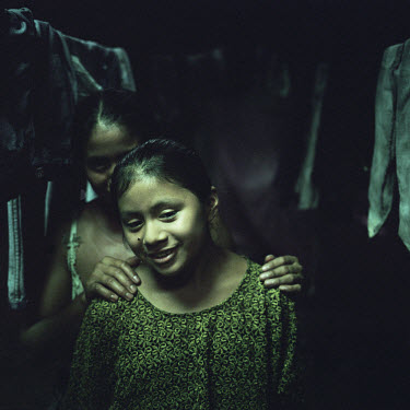 Rita Caal (31) and her daughter Claudia Aracely Maquin Caal (12). Guatemala is one of the 70 countries to have failed to achieve the Millennium Development Goal of gender parity in education in 2005.