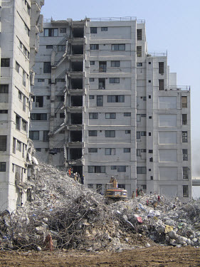 The ruins of the Margalla Towers residential complex, which collapsed during the earthquake which struck Pakistani-administered Kashmir on 08/10/2005. At least 40,000 people were killed by the 7.6 mag...