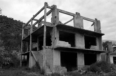 The landscape of the Drina Valley, near the Serbian border is littered with the remains of houses destroyed by Serbian forces during the ethnic cleansing of the area in Eastern Bosnia. This was the sc...