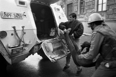Egyptian United Nations (UN) soldiers help wounded Bosnian civilians to safety after a mortar attack on the city centre. Around 250,000 people lost their lives in the conflict between Bosnian Muslims,...