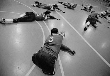 The Bosnian disabled volleyball team train before an international match. Many of them lost limbs in the war.