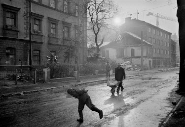 Citizens make use of a ceasefire to collect water during the siege on Sarajevo by Serb troops. Gas and electricity were cut off for long periods during the 4-year siege, in which over 10,000 people we...