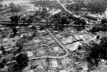 An aerial view of a devastated village near Banda Aceh following the tsunami which struck South Asia on 26/12/2004. An earthquake of magnitude 9 triggered a series of tidal waves which caused devastat...