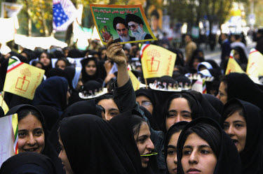 Crowds gather outside the former US Embassy in Tehran to mark the 25th anniversary of its seizure by student militants, which led to a year-long hostage crisis.