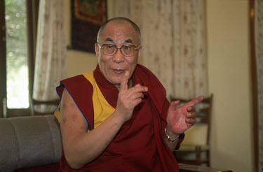The Dalai Lama, the exiled spiritual leader of the Tibetan people in discussion in his residence.