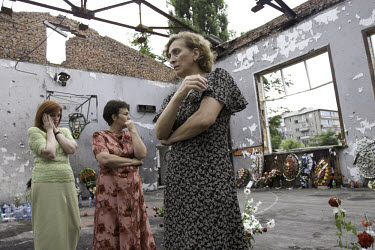 Grieving women in the gymnasium where 330 people, many of them children, died in the shootout between Russian security forces and Chechen rebels which took place in Beslan's School Number One after it...