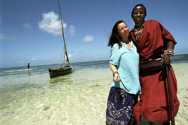 A Masai man, Musa, with his German girlfriend Brigitta. The beaches around Mombasa are well known to tourists from Europe, not only for their sea, sun and sand but also for picking up local men and wo...