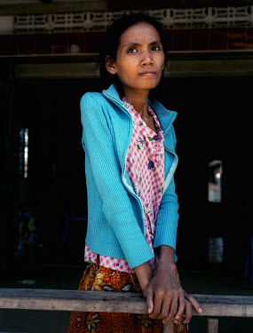 Bopha managed to escape the violent brothel to which she'd been sold at the age of 15.  She is HIV positive.