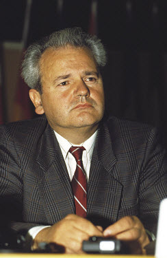 Slobodan Milosevic, then Yugoslav president and Serbian leader, in talks at the Hague in 1991 during the break-up of the former Yugoslavia.