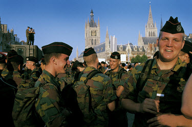Belgian soldiers at the marketplace preprare themselves for the last day of walking of the Vierdaagse van de IJzer, a four-day march organised by the Belgian Ministry of Defence. It is undertaken by b...