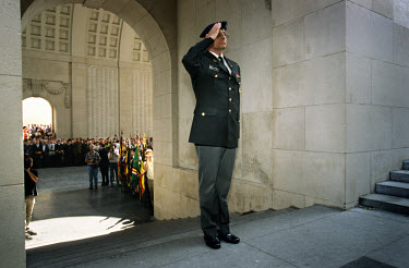 A Belgian veteran stands in salute during a memorial service remembering the soldiers who died during World War One (WWI).