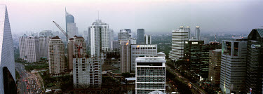 City centre skyline with high-rise buildings and tower blocks.