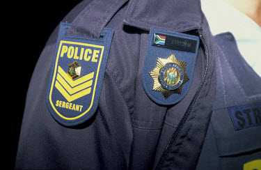 Badges and epaulettes of a police sergeant from Johannesburg's flying squad.