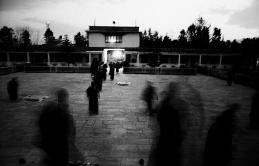 Tibetan Buddhist monks go back to their rooms in Shechen monastery. About 300 monks live in the monastery, from a total of around 20,000 Tibetans living in exile in Nepal.