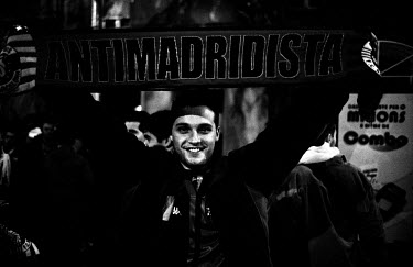 'AntiMadridista' - a fan with an anti-Madrid scarf outside Camp Nou before a football match between FC Barcelona and Real Madrid. 'El Clasico' is not just a match between the two biggest clubs in Spai...
