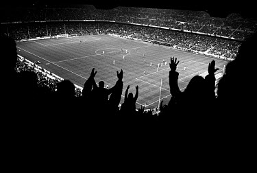 FC Barcelona supporters in Camp Nou watch the football match against Racing. The stadium holds 98,000 spectators.