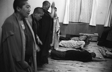 Exiled Tibetan nuns at prayer in a convent.