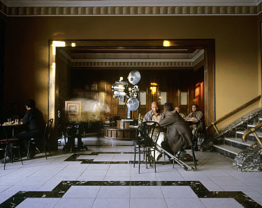 Men relax in the Cinema Roma cafe. The Art Deco style cinema was built by Italian colonists in 1937. Asmara is a treasure trove of Art Deco architecture and UNESCO is considering making the city a Wor...