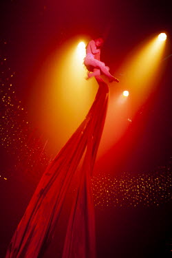 An acrobat entertains wealthy young clubbers at the fashionable Diaghilev Nightclub. The Russian nouveau-riche (nicknamed the ^New Russians^) have become renowned for flaunting their wealth.