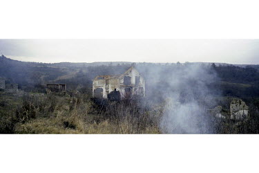 An abandoned house in the majority Serbian village of Dolac (Dolc in Albanian). The village still lies in ruins, seven years after it was destroyed by vengeful Albanians when Serb troops withdrew at t...