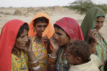 Women sing traditional songs to bring rain to their drought stricken villages near Jaisalmer.