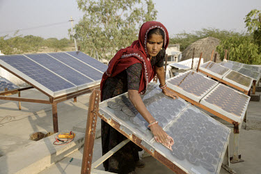 Kamla, age 33, is Rajasthan's first female solar engineer. Starting her education at age 11 in night school, while carrying on with her domestic and farm work, she went on to study solar technology an...