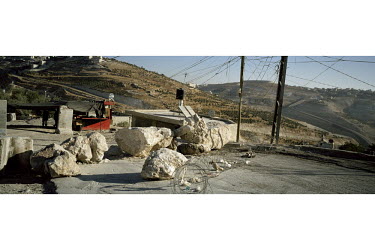 The Israeli checkpoint at the entrance to Sheikh Sa'ad, a Palestinian village officially in the West Bank, but on the Jerusalem side of the separation wall / barrier. This means that its inhabitants c...