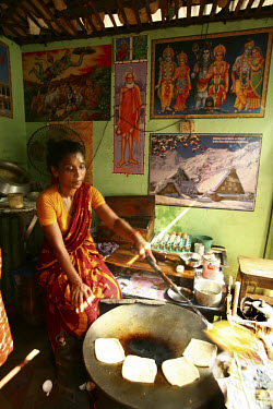 A sex worker working at a restaurant inside Tangail brothel. Older sex workers often become maid servants for the sardarni (madam) and the sex workers in the brothel.