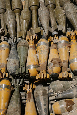 Mortar and RPG (rocket propelled grenade) rounds lie in a pit awaiting destruction by a Weapons and Ammunition Disposal unit from the HALO Trust (Hazardous Areas Life-Support Organisation), an NGO inv...