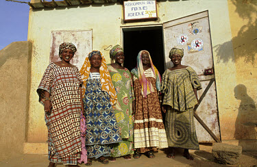 Members of a local women's group (Association des Femmes) outside their office.