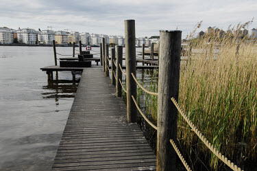 A jetty in the redeveloped dockland area of Hammarby Sjostad. The Hammarby Sjostad district, a former brownfield site, is now being redeveloped to provide environmentally friendly, ecologically sustai...