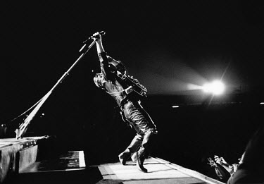 Bono, the lead singer of the rock band U2, performs at a concert in Copenhagen.