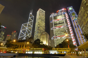 The Bank of China, the Cheung Kong Centre, the HSBC bank and the Standard Chartered Bank skyscrapers (left to right) in the Central Business District (CBD) at dusk. The domed colonial-era building con...