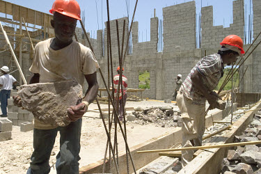 Construction workers on site at the new Montserrat Cultural Centre. The centre was funded by money raised by longtime Montserrat homeowner Sir George Martin.