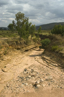 A dry riverbed near Water. The town's rather apt name is linked to the fact that it was once a flat plain with plenty of natural springs. However, the springs dried up and have only recently been rest...