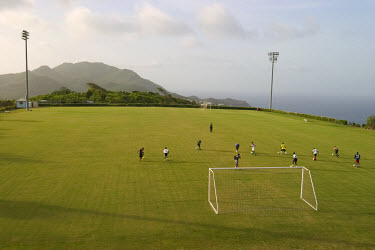 Montserrat's football team training on a new pitch built with funding from FIFA.