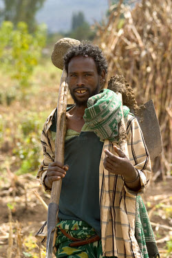 A hill farmer working in the mountains just outside Dire Dawa. New water schemes have helped to replenish the groundwater in this area and have subsequently increased local productivity.
