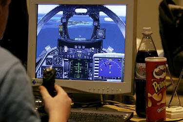 While most of the flight simulator enthusiasts fly airliners, some also enjoy the occasional dogfight in a jet fighter. In this case an F-14, armed with sidewinders, a tube of Pringles and a bottle of...