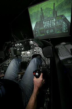 F-16 jet fighter simulator, used by the Royal Norwegian Air Force for procedures training and recruitment purposes. Flight simulator enthusiasts gathered for three days of virtual flying in a hangar a...