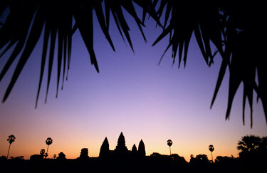 Sunrise at Angkor Wat. Angkor Archaeological Park outside Siam Reap contains numerous temples and ruins. Most famous is the Angkor Wat, a temple built by King Suryavarman II. Originally built in honou...