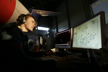 Sondre L. Aabo (18) working a shift as an Air Traffic Controller. Flight simulator enthusiasts gathered for three days of virtual flying in a hangar at Oslo Airport Gardermoen. Flying all sorts of air...