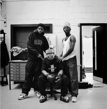 Marvin (centre) prepares for his bout. The Boys to Men project in Peckham, South London is an intervention project for inner city boys involved in street gangs. It aims to divert them away from the da...
