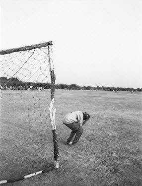 The Turalei goalkeeper holds his head as his team misses another chance in the football event. 3,000 young competitors and spectators came together in Twic county, southern Sudan, to compete in the fi...