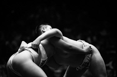 Two Young Rikishi Sumo compete during the championship finals. 450 children, aged between 11-14, qualified for the All Japan Wanpaku Sumo Tournament held at the Ryogoku Kokugikan Stadium.