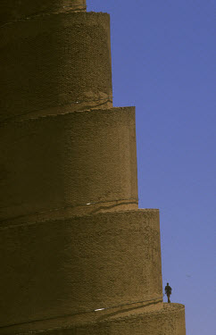 A lone figure climbs the minaret of the Malwiya mosque, completed in the year 849AD and constructed in the form of a Mesopotamian ziggurat.