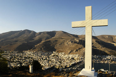 Catholic holy cross above the town of Pothia, the major port and capital of the island.