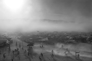 A sandstorm sweeps through the temporary city constructed by visitors to the Burning Man Festival. Each year tens of thousands of people amass in the Nevada desert to take part in what organisers desc...