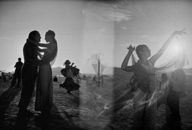 Dancing in the desert. Each year tens of thousands of people amass in the Nevada desert for the Burning Man Festival, to take part in what organisers describe as an experiment in community, radical se...