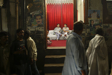 Two sex workers waiting for customers in Lahore's red light district.