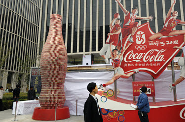 Advertising promotion for Coca-Cola using sporting images in preparation for the Beijing 2008 Olympic Games, outside a shopping centre.